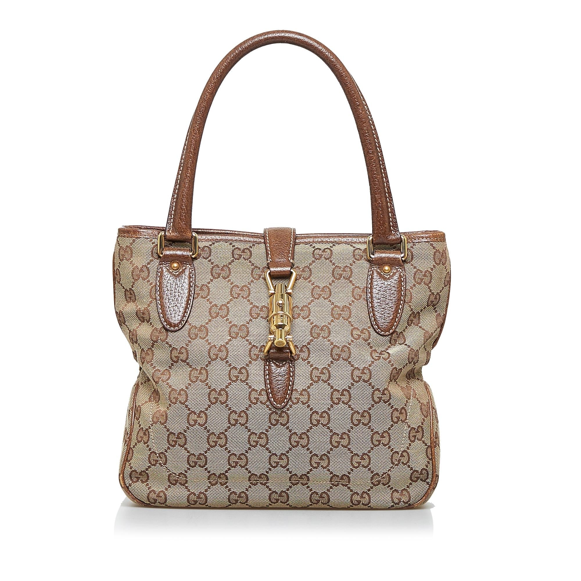 Gucci GG Canvas Jackie Piston Lock Handbag