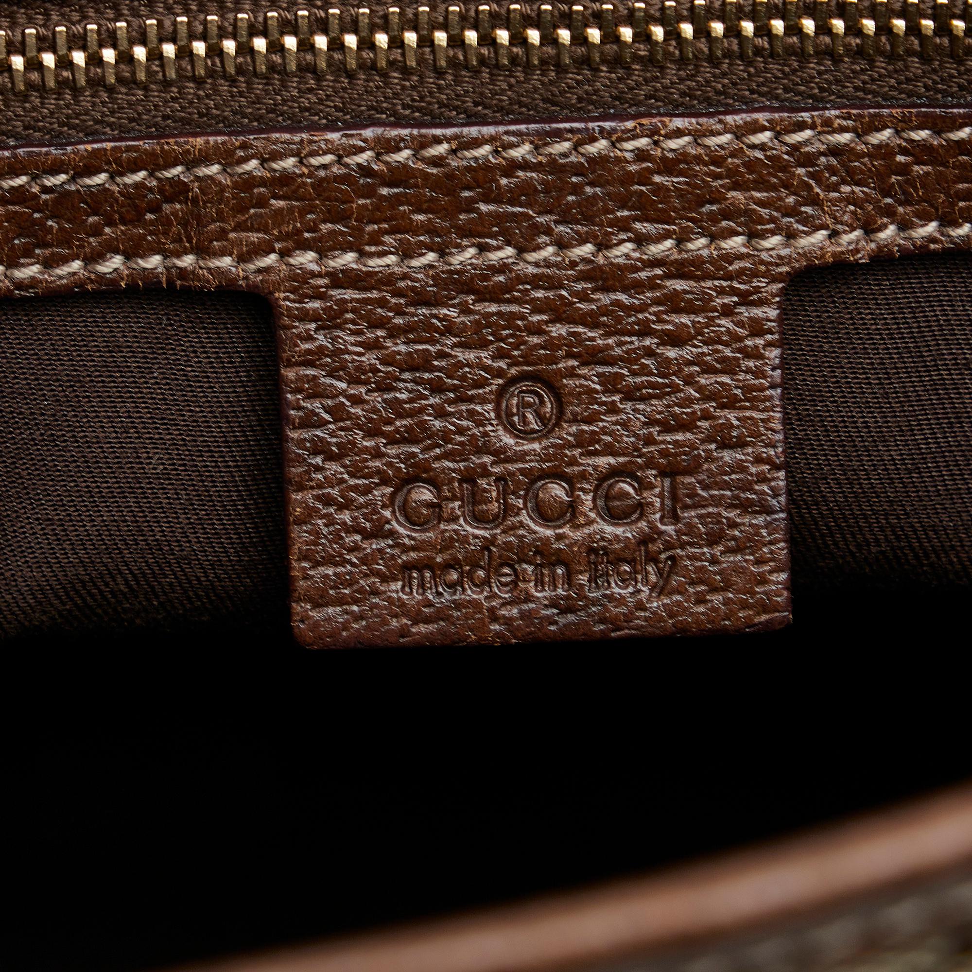 Gucci GG Canvas Jackie Piston Lock Handbag